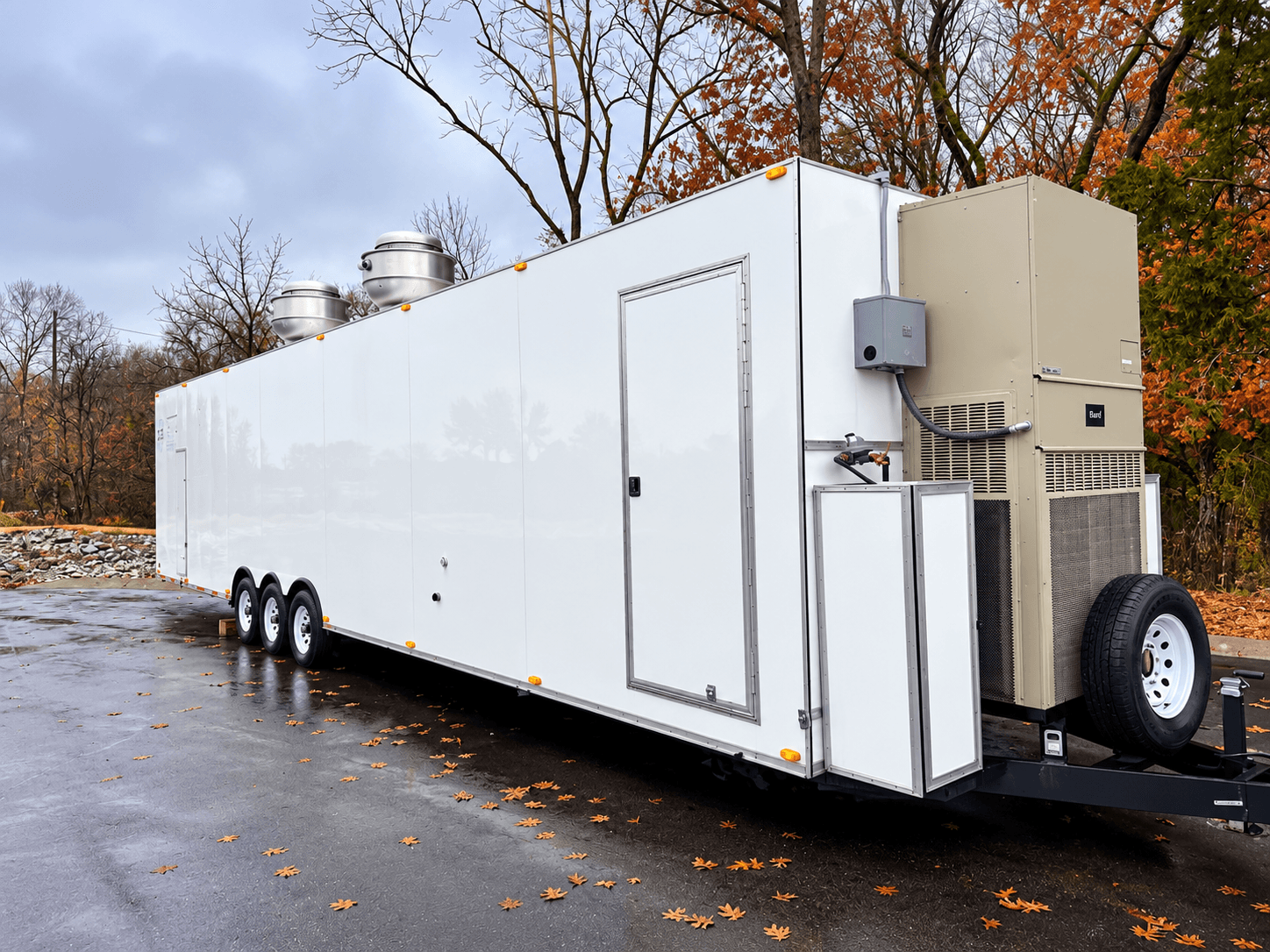 Kitchen trailer exterior with doors, ventilation and service equipment
